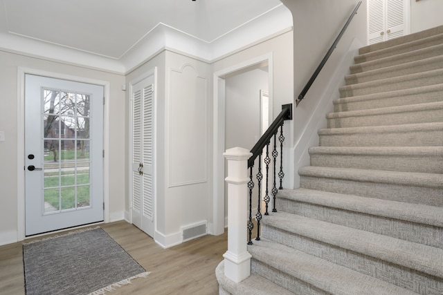 foyer with light hardwood / wood-style flooring