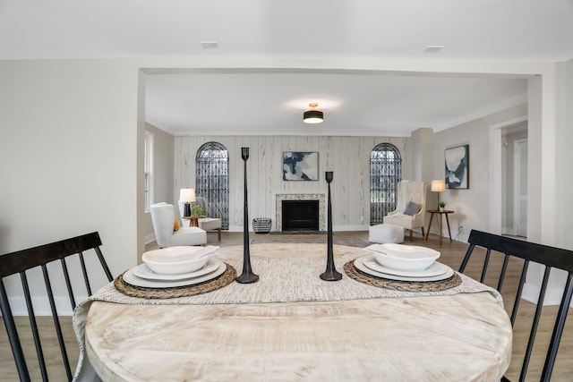 dining space with hardwood / wood-style flooring