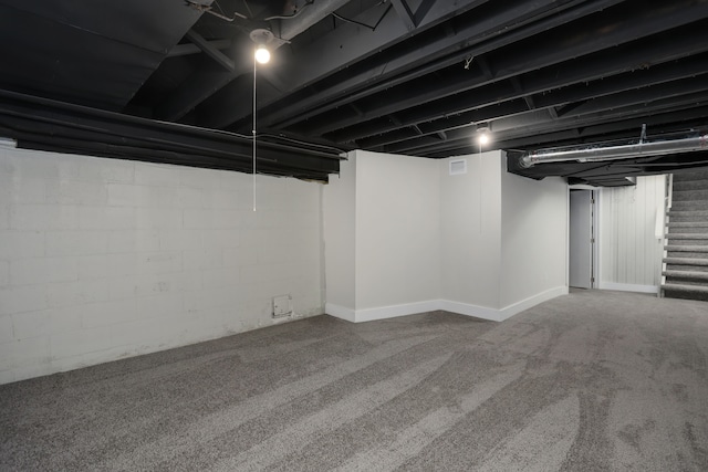 basement with carpet flooring