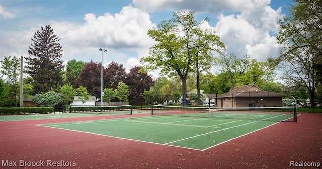 view of tennis court featuring basketball court