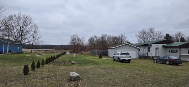 view of yard with a garage