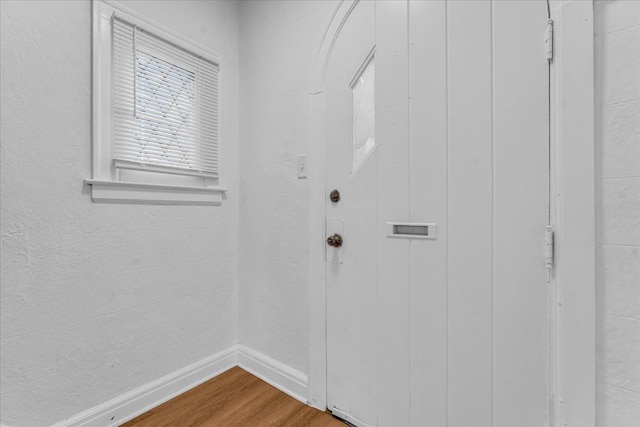 doorway featuring hardwood / wood-style floors