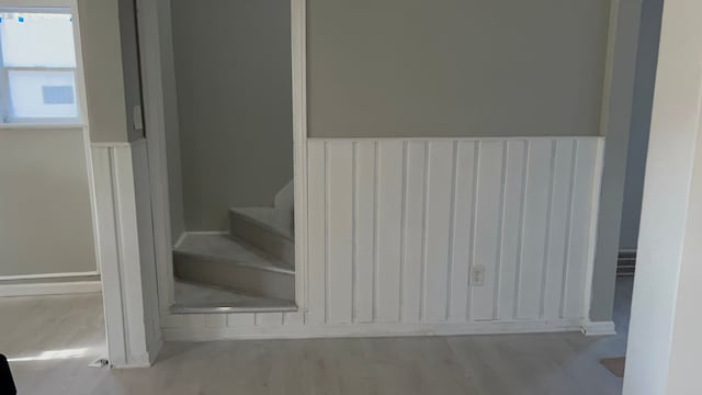 staircase featuring hardwood / wood-style floors