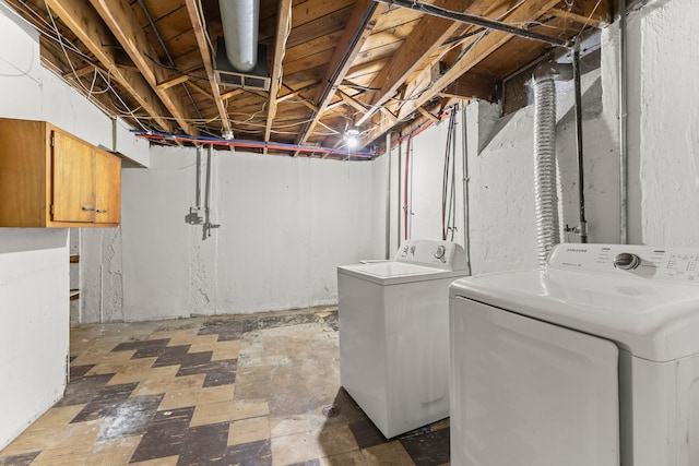 laundry room with separate washer and dryer