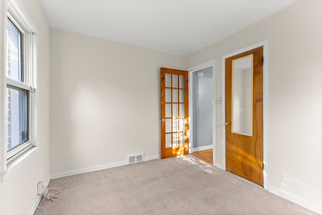 view of carpeted spare room