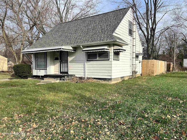 view of front of home with a front yard