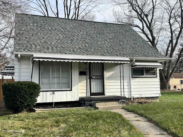 bungalow with a front lawn