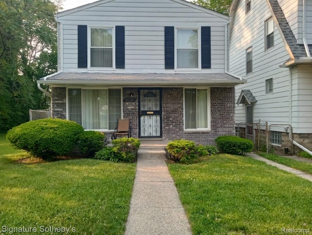 8240 Desoto St, Detroit, MI 48238 - view of front of home featuring a porch and brick siding