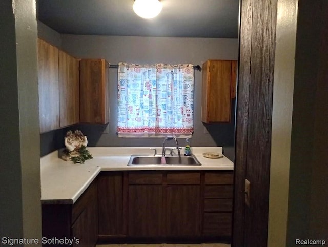 8240 Desoto St, Detroit, MI 48238 - kitchen featuring a sink and light countertops