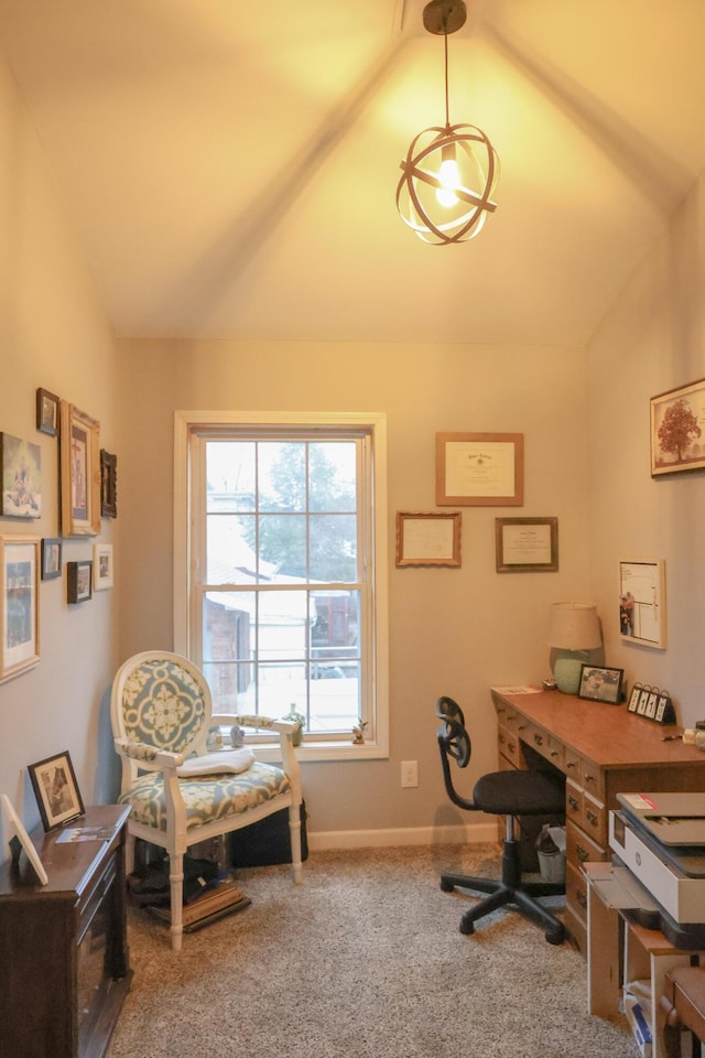 carpeted office space with lofted ceiling and baseboards