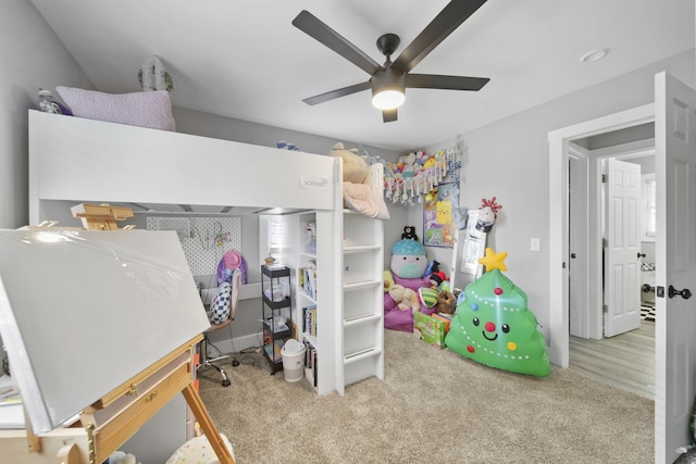 bedroom with hardwood / wood-style flooring and ceiling fan