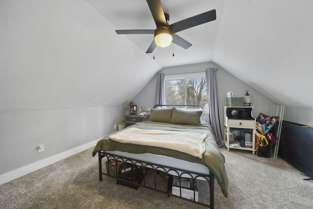 bedroom featuring carpet flooring, vaulted ceiling, and ceiling fan