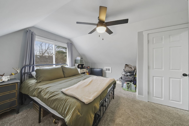 bedroom featuring carpet flooring, ceiling fan, and lofted ceiling