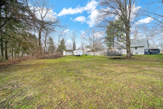 view of yard with a trampoline