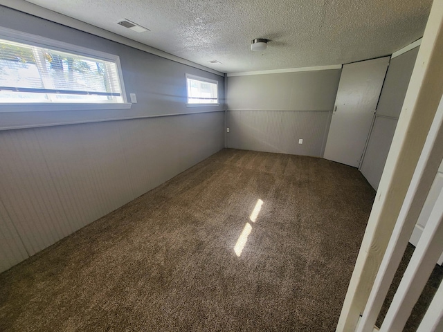 interior space featuring a textured ceiling