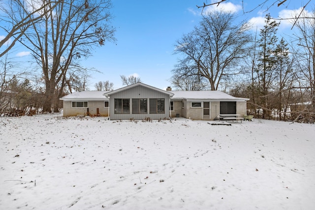 view of snow covered house