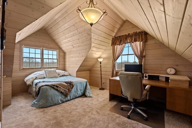 bedroom with light colored carpet, vaulted ceiling, wood ceiling, and wooden walls