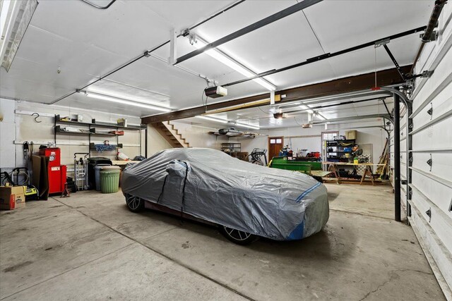 garage featuring a garage door opener