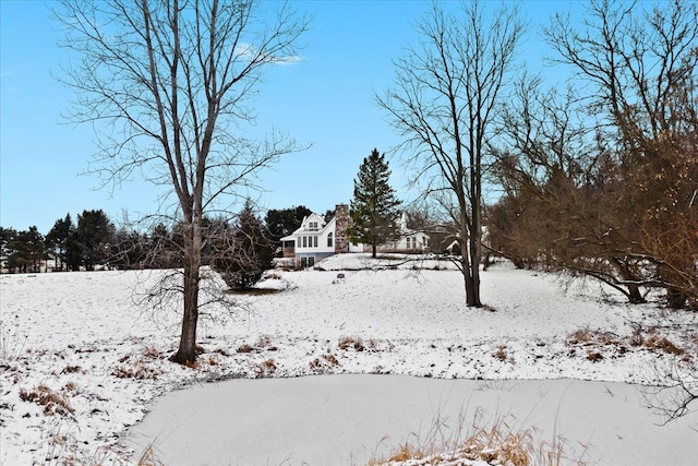 view of snowy yard