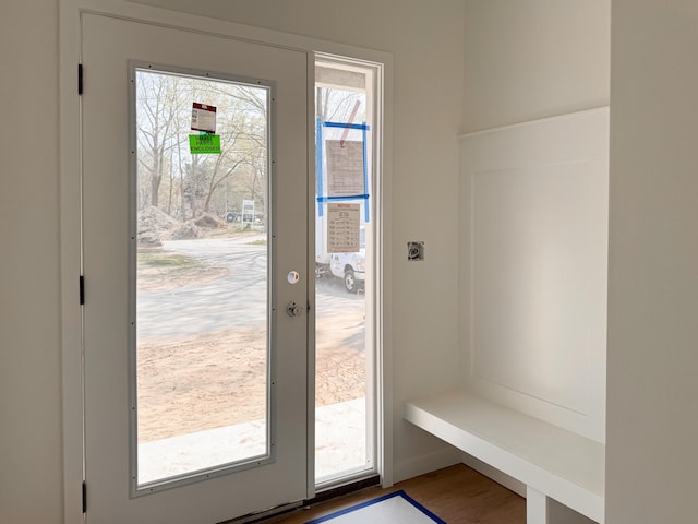doorway with wood finished floors