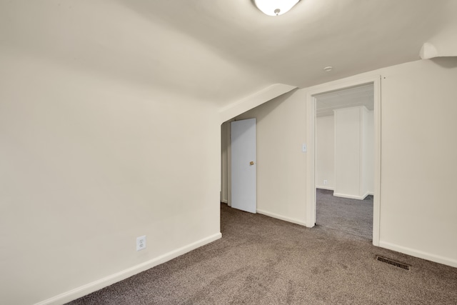 bonus room with carpet