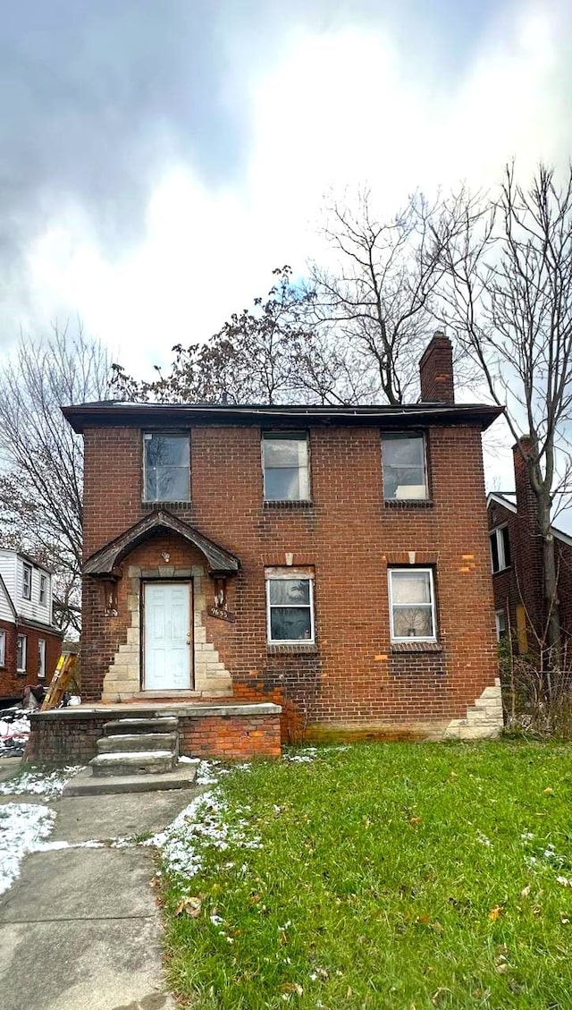 view of front of home featuring a front yard