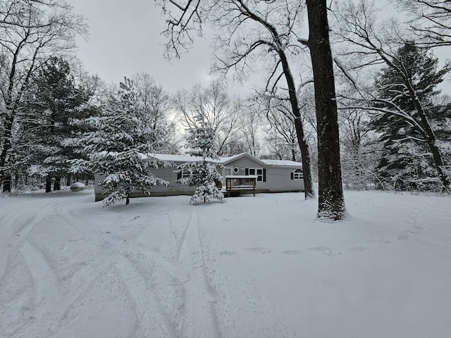 view of front of property with a wooden deck