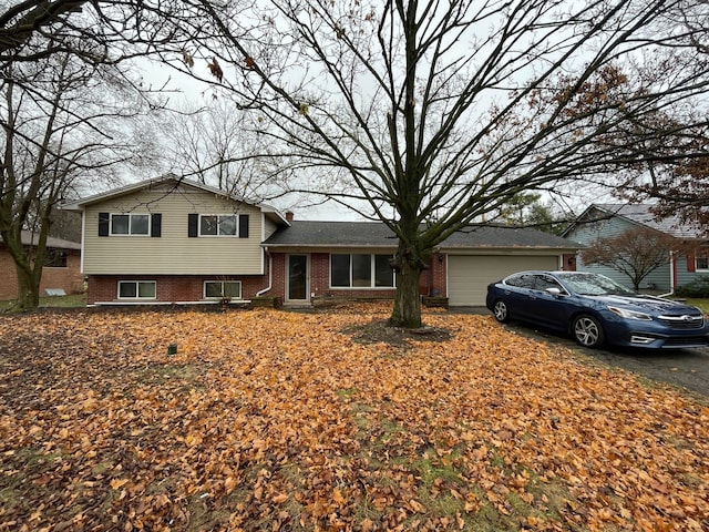 split level home featuring a garage