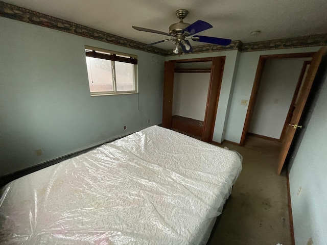 unfurnished bedroom featuring ceiling fan