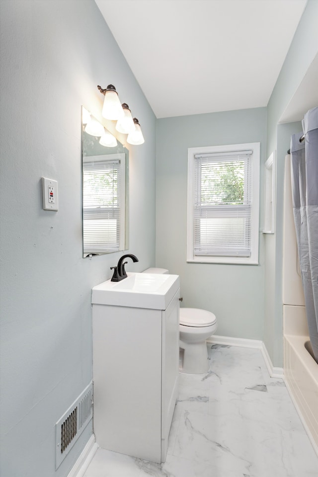 full bathroom with a wealth of natural light, vanity, shower / bathtub combination, and toilet