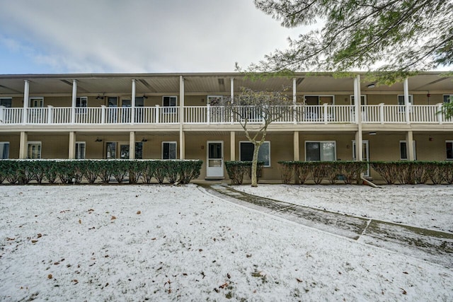 view of snow covered property