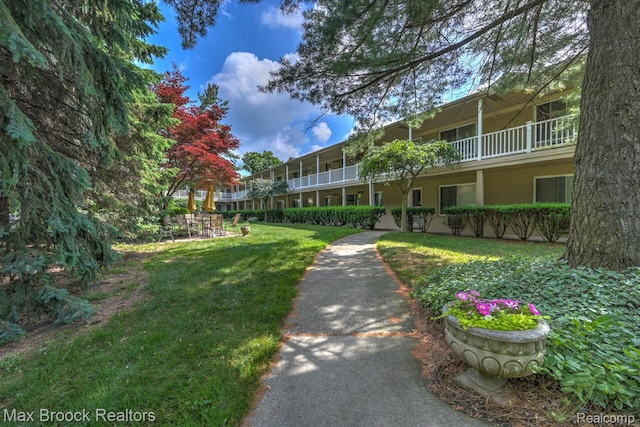 475 S Adams Rd Unit 7, Birmingham, MI 48009 - view of home's community featuring a lawn