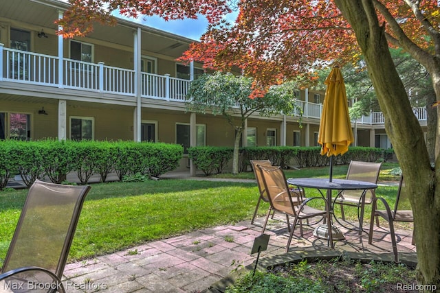 475 S Adams Rd Unit 7, Birmingham, MI 48009 - view of home's community featuring a lawn and a patio