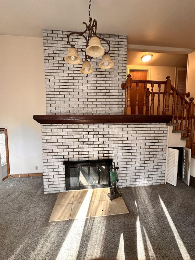 living room featuring carpet flooring and a brick fireplace