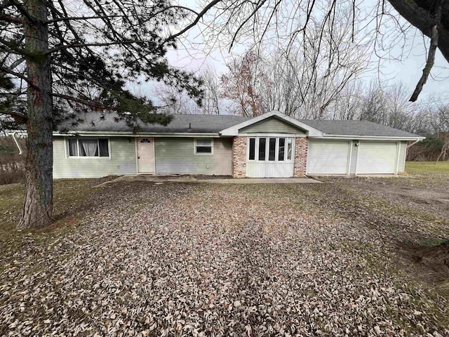 view of front of property featuring a garage