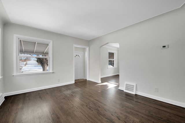 interior space with dark hardwood / wood-style flooring