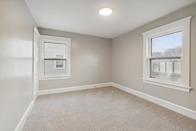 view of carpeted spare room