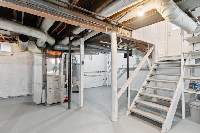 basement with gas water heater and heating unit