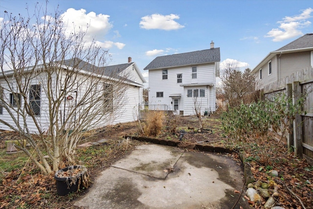 back of property featuring a patio