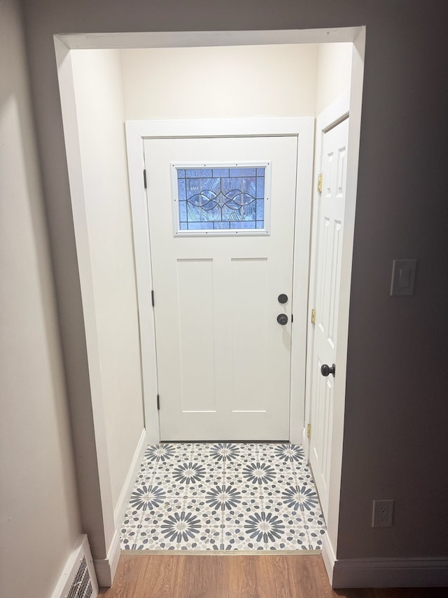 entryway featuring hardwood / wood-style flooring