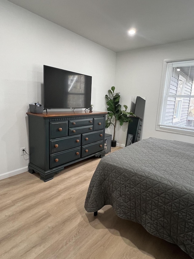 bedroom featuring light hardwood / wood-style flooring