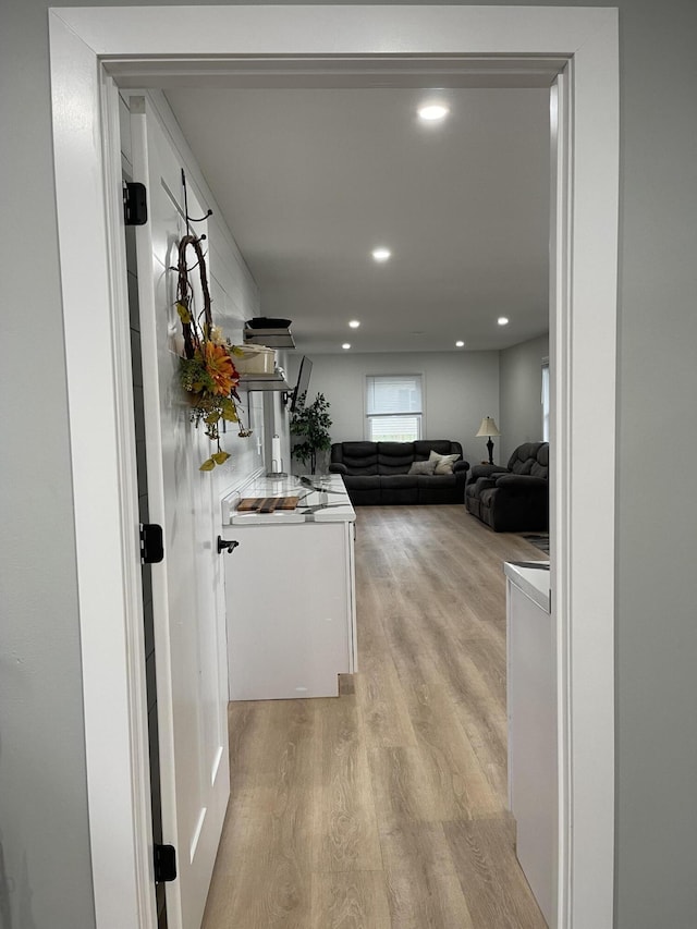 hallway featuring light hardwood / wood-style flooring