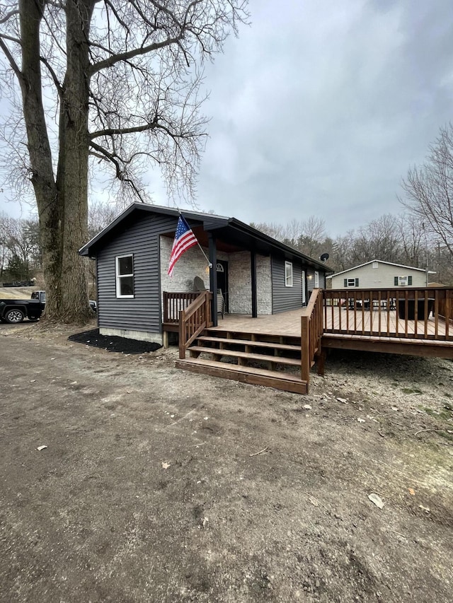 view of front of house featuring a deck