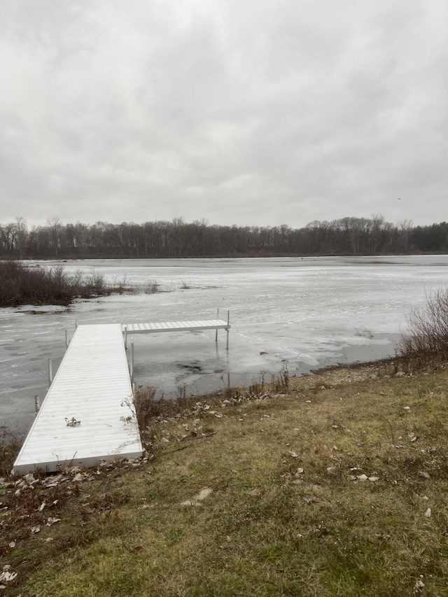 view of dock with a water view