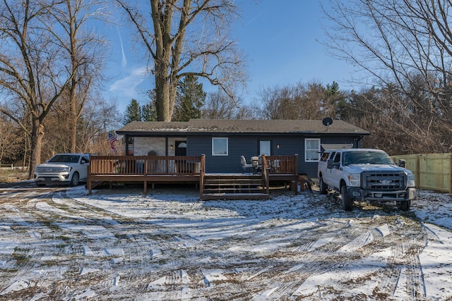 view of front of home with a wooden deck