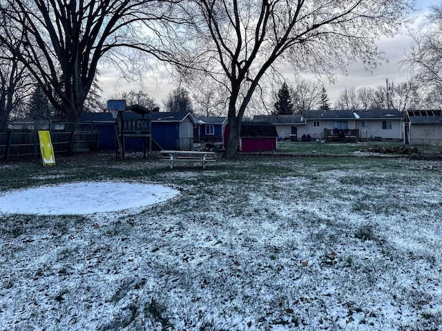 view of yard covered in snow