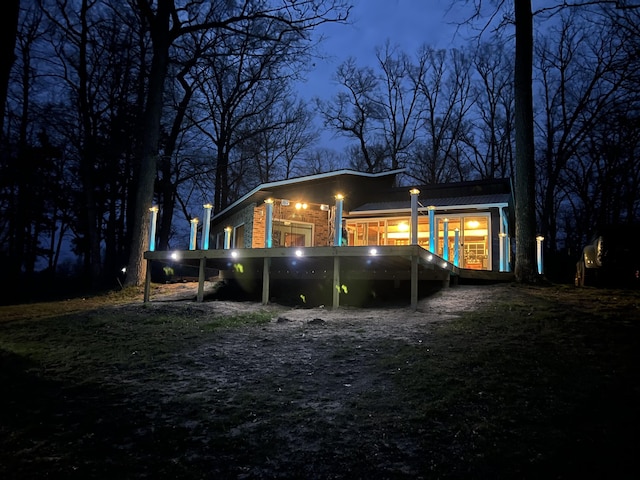 10921 N Pine Grove Ln, Bitely, MI 49309 - view of back of house at twilight