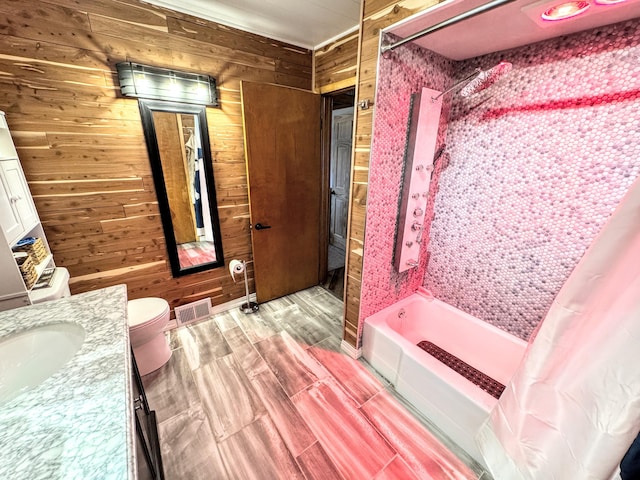 10921 N Pine Grove Ln, Bitely, MI 49309 - full bath featuring vanity, wood walls, shower / bathtub combination with curtain, and wood finish floors