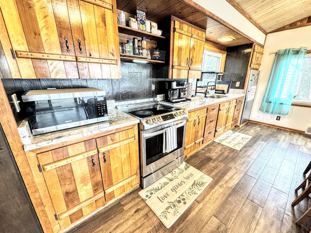 10921 N Pine Grove Ln, Bitely, MI 49309 - kitchen with appliances with stainless steel finishes, wooden ceiling, dark wood-type flooring, light countertops, and open shelves