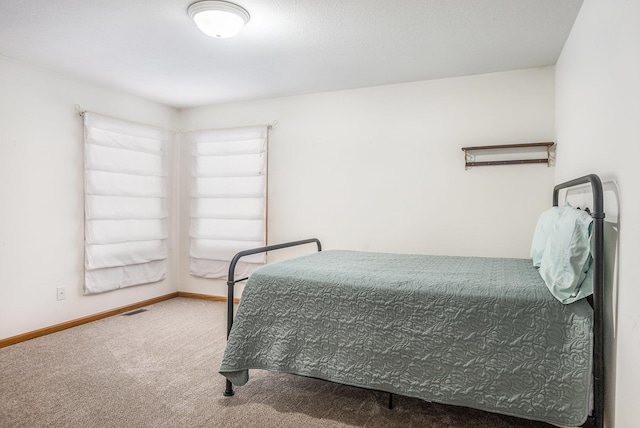 bedroom featuring carpet